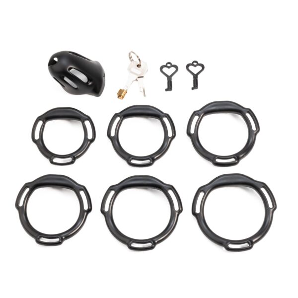 oval-ventilated-resin-chastity-cage-set-configuration-12.jpg Oval ventilated cage configuration 12 and included accessories