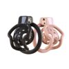 Pink and black color options of the spider-frame plastic chastity cage