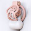 Pink spider-frame plastic chastity cage front view on display form