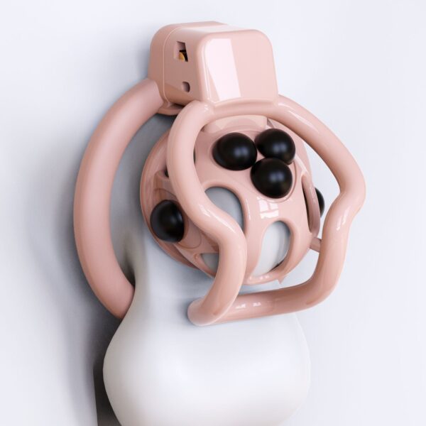 spider-frame-plastic-chastity-cage-with-silicone-studs-pink-stud-detail.jpg Pink spider-frame chastity cage showing removable silicone stud placement